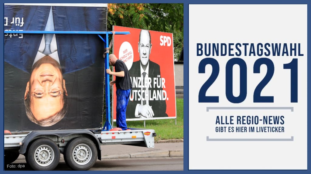 Magdeburg: Mitarbeiter einer Werbefirma bauen Wahlplakate der CDU und SPD in der Landeshauptstadt ab.