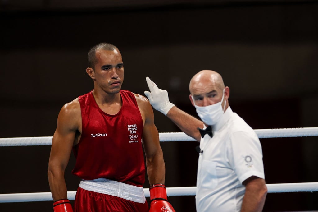 Hat Aufnahme in Uruguay gefunden: Eldric Sella Rodriguez (l), Boxer vom Refugee Olympic Team (EOR).