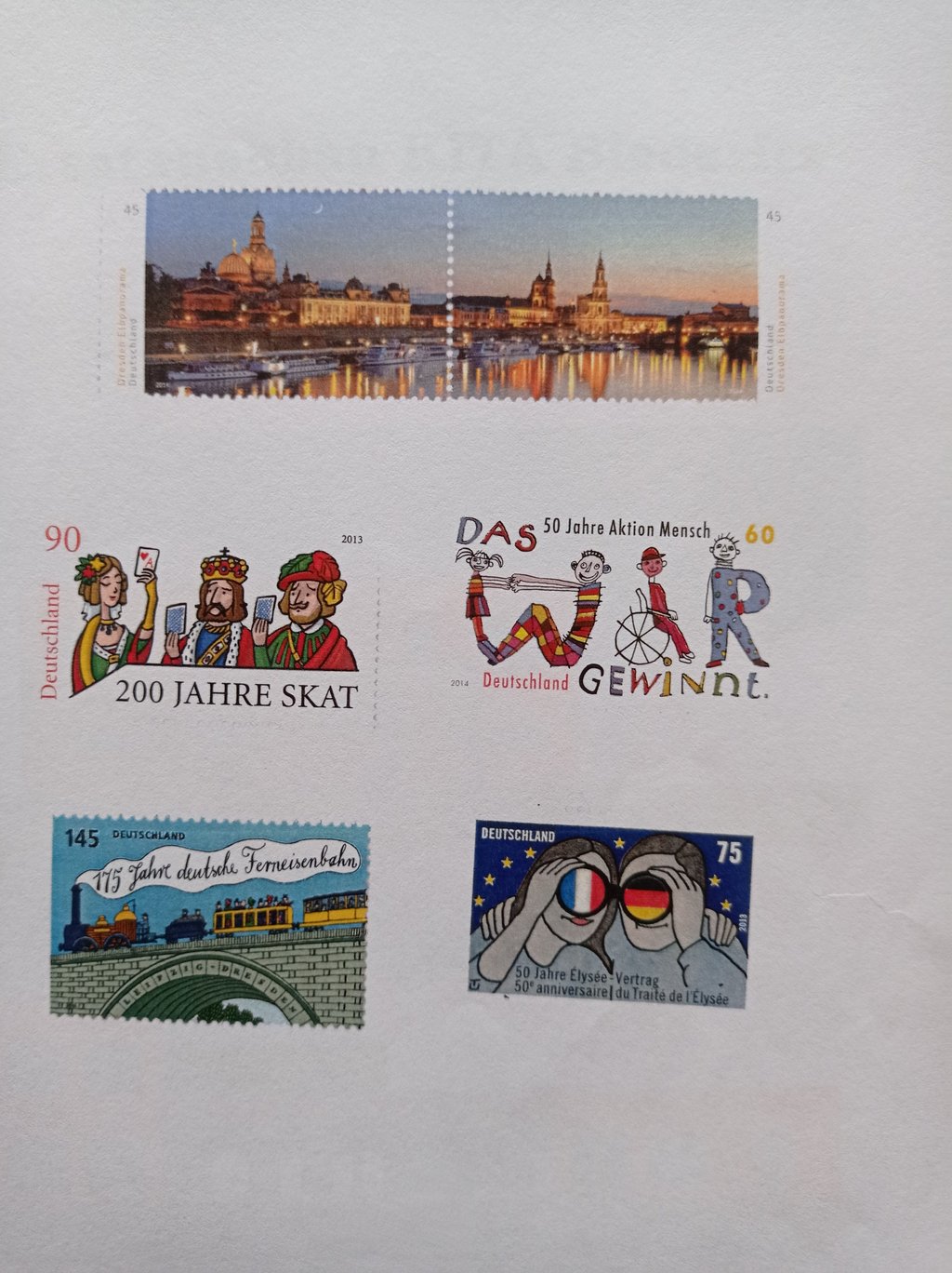 Dieses Briefmarkenset wurde in einer Hülse in den Boden der Kita Ehlespatzen mit eingelassen.