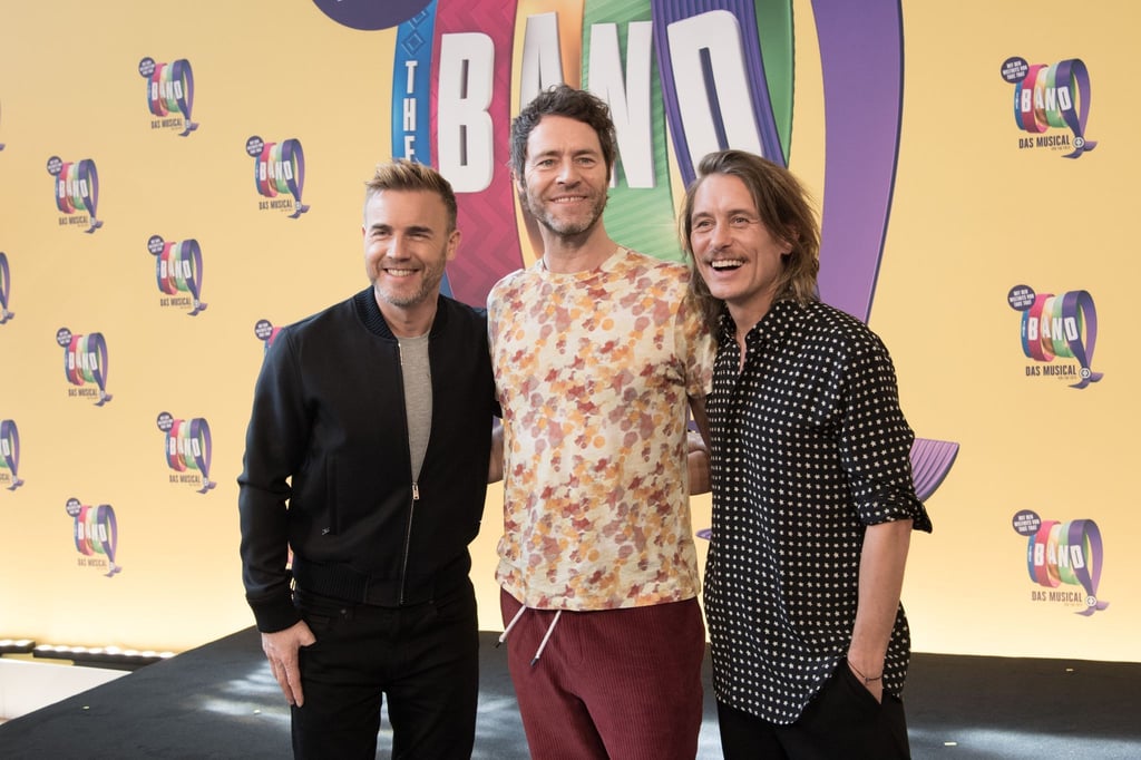 Gary Barlow (l-r), Howard Donald und Mark Owen stellen das Musical „The Band“ in Berlin vor.
