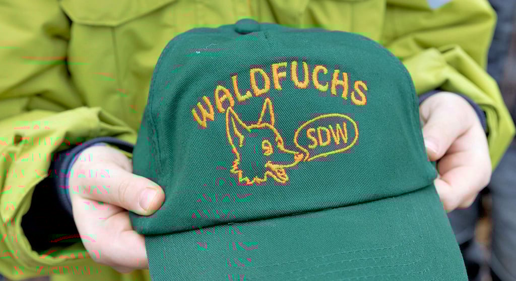 Die Mütze ist das Erkennungszeichen der „Waldfüchse“.