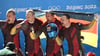 Bobpilot Francesco Friedrich mit seinem Team Thorsten Margis, Candy Bauer und Alexander Schüller aus Deutschland feiern ihre Goldmedaille.
