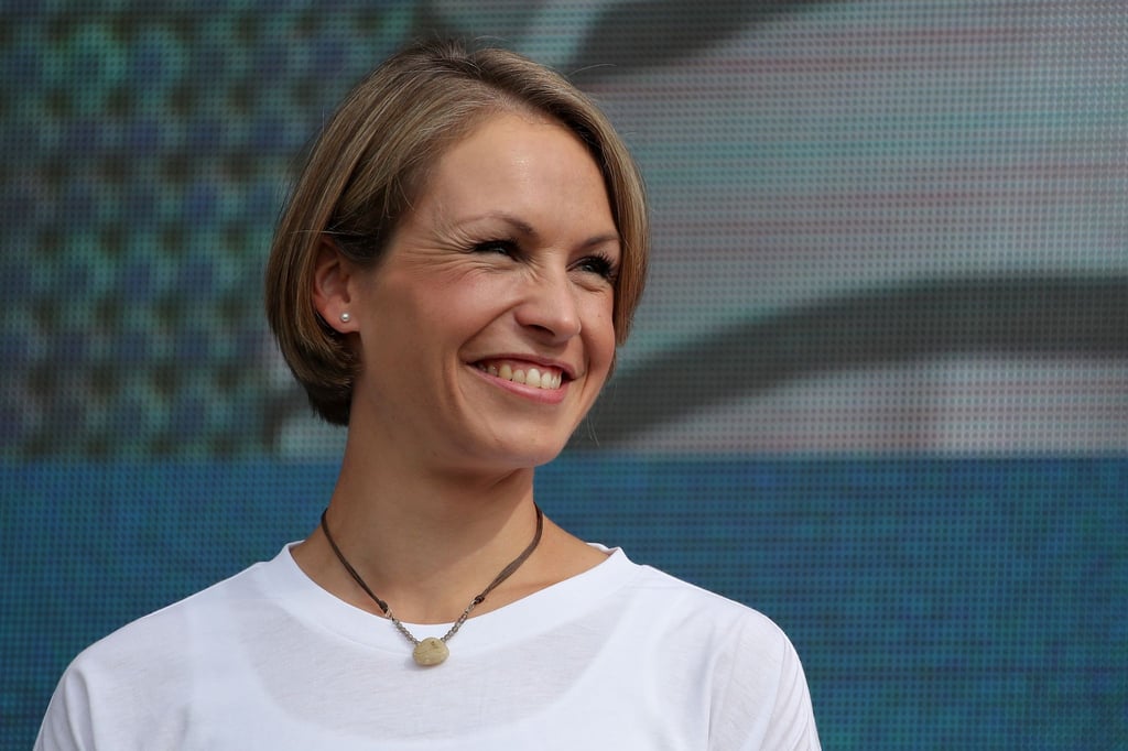Magdalena Neuner, ehemalige deutsche Biathletin, freut sich über Denise Herrmanns Olympiagold.
