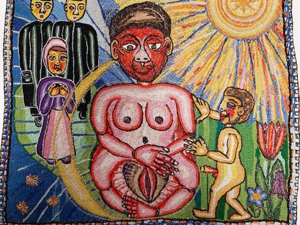 In bunten und freizügigen Stickbildern verarbeitete Helga Goetze ihre Botschaften. Das Bild trägt den Titel "Weiblicher Buddgha, Gaia, die Erdmutter" und stammt aus dem Jahr 1983.