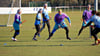 Quidditchspieler  der Blue Caps Berlin und der Ottos Occamys aus Magdeburg kämpfen um den Ball. 