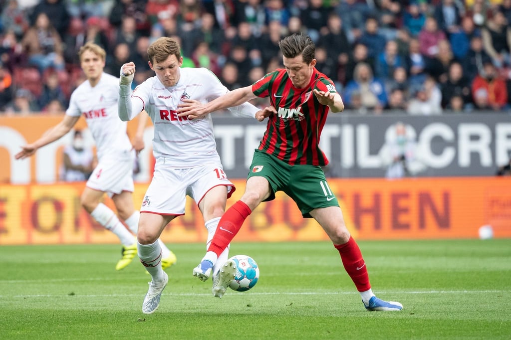 Luca Kilian (l) bleibt dem 1. FC Köln treu.