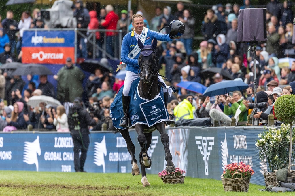 Christian Ahlmann auf seinem Pferd Dominator.
