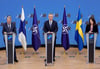 Nato-Generalsekretär Jens Stoltenberg (M), der finnische Außenminister Pekka Haavisto und die schwedische Außenministerin Ann Linde.