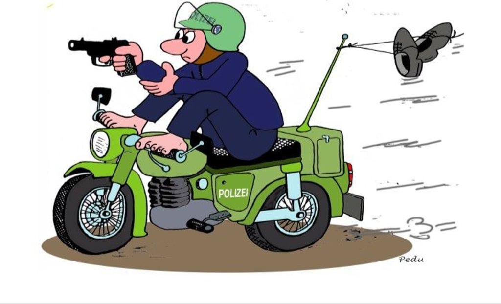 Karikatur von Peter Dunsch: Polizei, Waffen, Waffeneisatz. Er stellt sein neues Buch in der Magdeburger Stadtbibliothek vor.