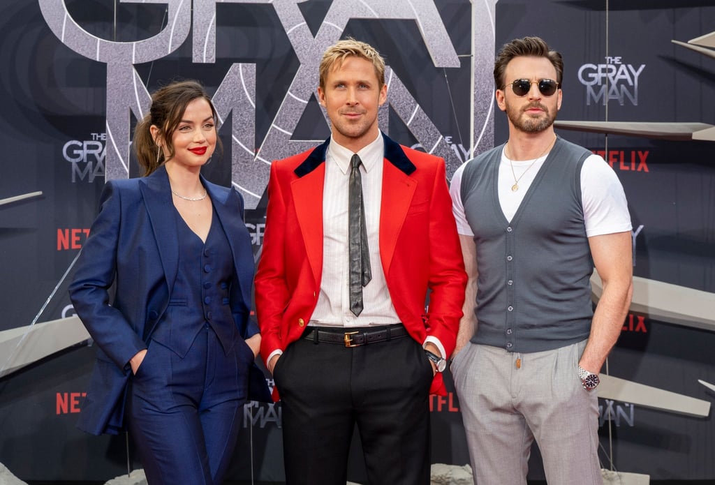 Die Schauspieler Ana de Armas (l-r), Ryan Gosling und Chris Evans bei Sondervorführung des Films „The Gray Man“ von Netflix in Berlin.