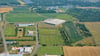 Ein Luftbild mit Blick auf das Industriegebiet West in Schönebeck: Aktuell sind die Gewerbeflächen zu 50 Prozent belegt. Derzeit gibt es Anfragen, die eine Vollauslastung möglich machen würden. Kann der Industriepark zukünftig erweitert werden? 