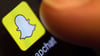 Das Icon von Snapchat auf einem Smartphone: Bei Snap stimmen die Zahlen nicht mehr. Hunderte Mitarbeiter müssen gehen.
