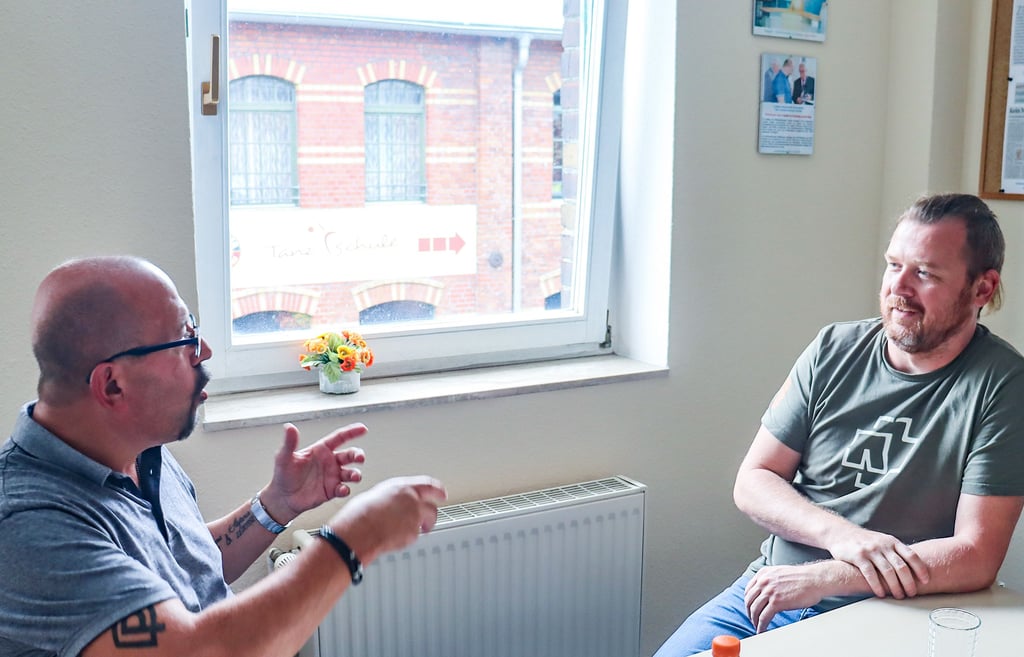 Uwe Kapper und Christoph Melle mitten in einer Diskussion.