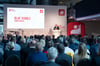 Kanzler Scholz hält bei der Feier zum 25-jährigen Bestehen der Gewerkschaft IG BCE in Hannover eine Rede.