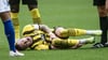 Dortmunds Marco Reus liegt während des Revierderbys verletzt am Boden.