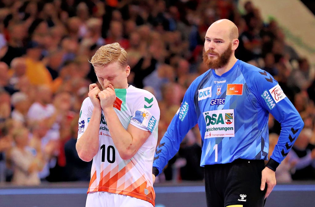 Nicht nur Gisli Kristjansson (l.) und Mike Jensen war die Enttäuschung anzusehen. In letzter Sekunde verlor der SC Magdeburg das Bundesliga-Topspiel bei der SG Flensburg-Handewitt.