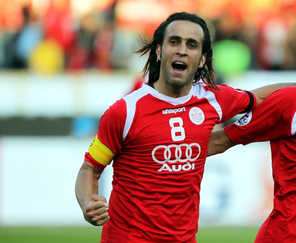 Hatte sich gleich zu Beginn mit den Protesten im Iran solidarisiert: Der frühere iranische Nationalspieler Ali Karimi.