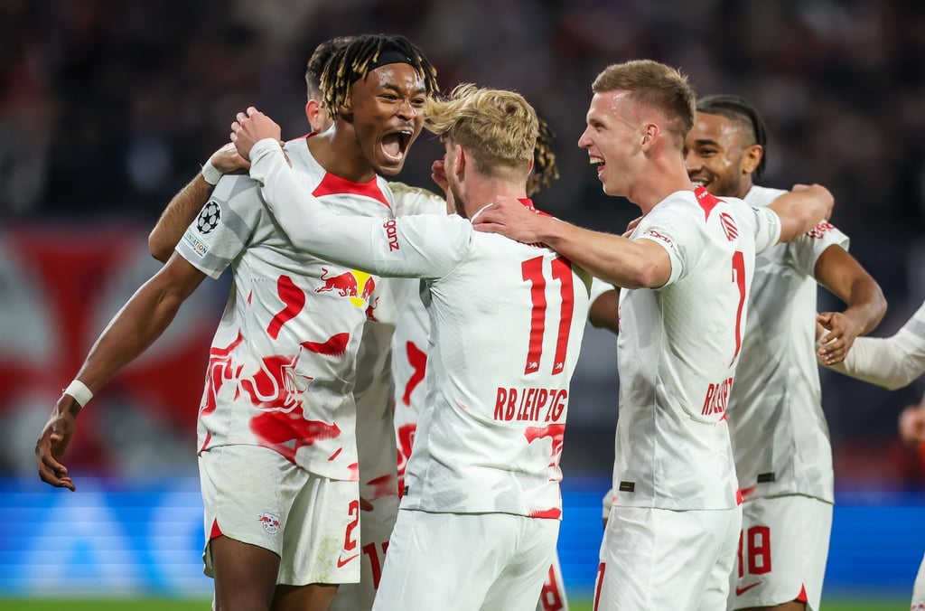 Leipzigs Spieler jubeln nach Timo Werners (M) Treffer zum 3:1 gegen Real Madrid.