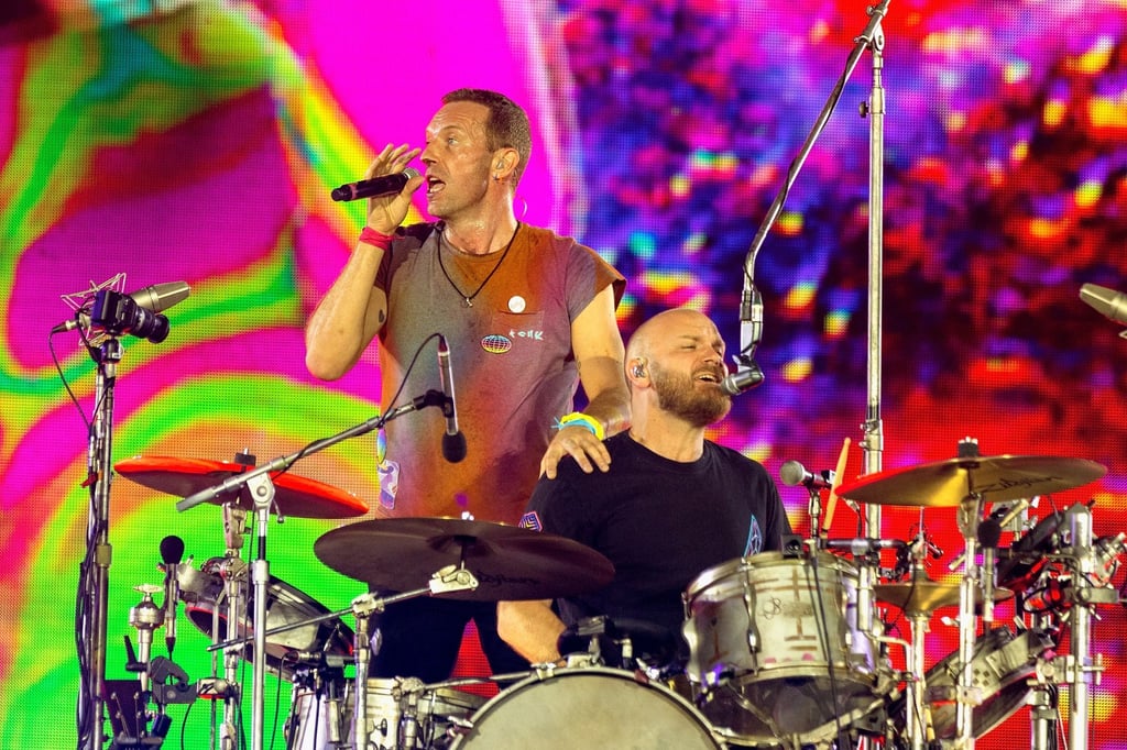 Sänger Chris Martin (l) neben Schlagzeuger Will Champion im August 2022 in London.