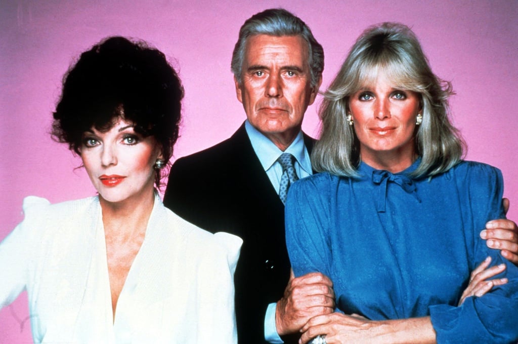 Die Schauspieler Joan Collins als Alexis Carrington (l-r), John Forsythe als ihr geschiedener Mann Blake Carrington und Linda Evans als seine neue Ehefrau Krystle Carrington in der US-Serie „Denver-Clan“.