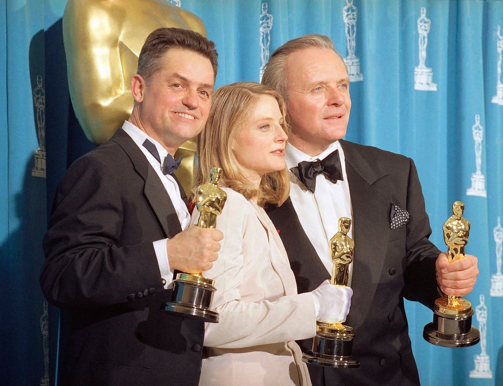 Der Regisseur Jonathan Demme (l-r), die Schauspielerin Jody Foster und der Schauspieler Anthony Hopkins bei der Oscarverleihung 1992.