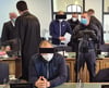 Die beiden Angeklagten beim Prozessauftakt  im Landgericht Magdeburg.