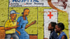 Auf dem Wandgemälde in Nairobi wird auf HIV und AIDS aufmerksam gemacht.
