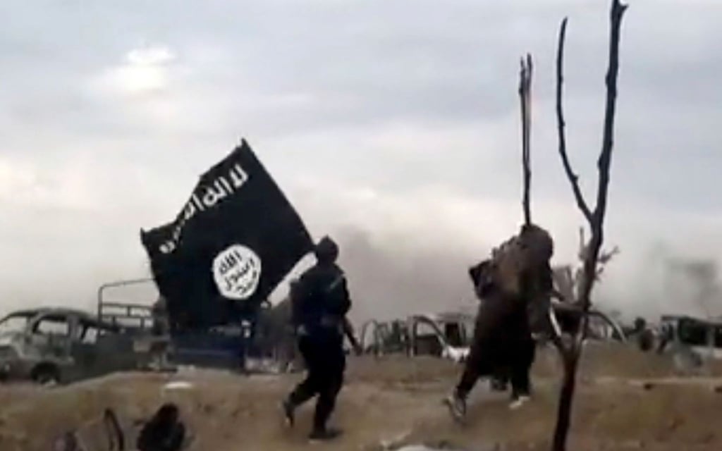 IS-Kämpfer im syrischen Baghus: Der IS kontrollierte über Jahre große Gebiete im Irak und im benachbarten Bürgerkriegsland Syrien (Archivbild).