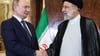 Dieses von der staatlichen russischen Nachrichtenagentur Sputnik über AP veröffentlichte Bild zeigt Kremlchef Wladimir Putin (l) und Irans Präsident Ebrahim Raisi am 18.07.2022 bei Gesprächen in Teheran.