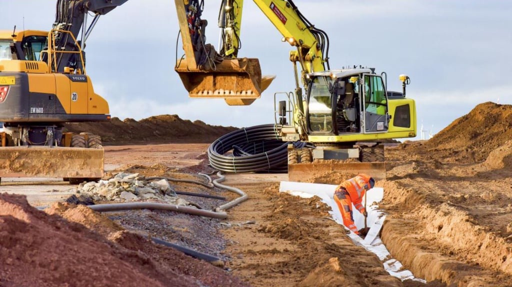 An der neuen Ortsumfahrung Aschersleben/Süd - Quenstedt wird fleißig gebaut. Neben der Straßenschicht auch die Versorgungskanäle.