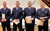 Denny Tobisch, Mario Steffen, Sven Schmied, Dirk Hühne (von links) wurden für 30-jährige Feuerwehrmitgliedschaft geehrt. 