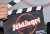 Eine Filmklappe mit der Aufschrift „Schlingel“.