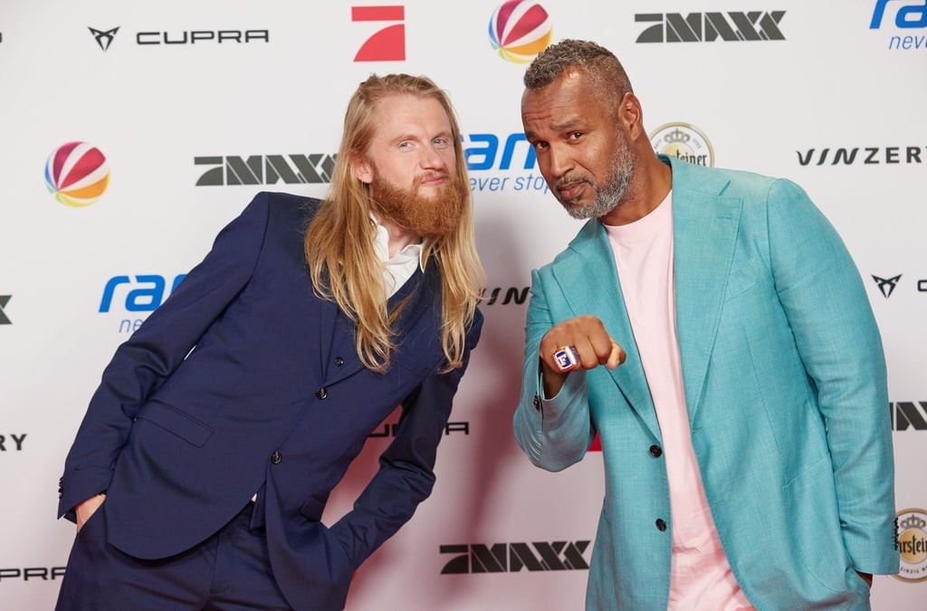 Fernsehmoderator Christoph „Icke“ Dommisch (l) und Patrick Esume, American-Football-Trainer.