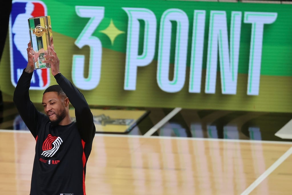 Damian Lillard von den Portland Trail Blazers jubelt nach seinem Sieg im Dreipunkte-Wettbewerb.
