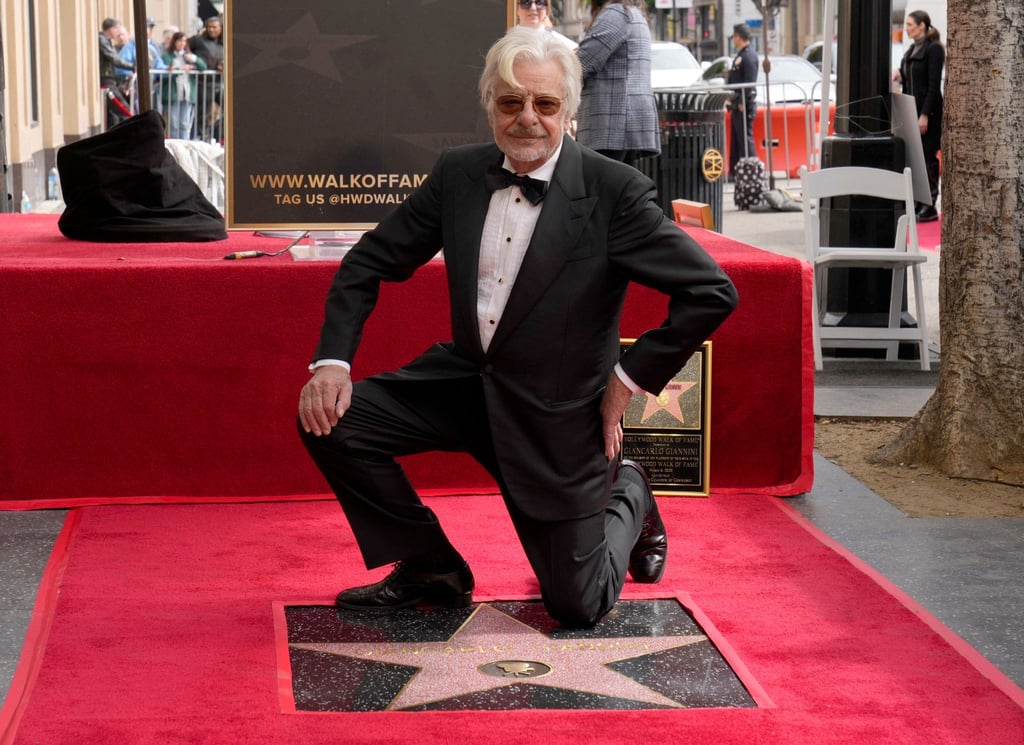 Der italienische Kinostar Giancarlo Giannini neben seinem Stern auf dem Hollywood „Walk of Fame“.