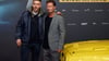 Der ehemalige Fußballer Lukas Podolski (l) und Til Schweiger (r) bei der Premiere des Films "Manta Manta – Zwoter Teil".