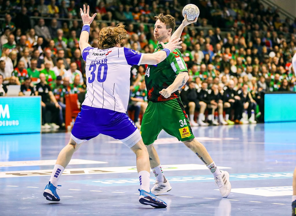 Michael Damgaard (am Ball/gegen Tom Kiesler vom VfL Gummersbach) ist längst nicht titelsatt. Drei Chancen auf eine Trophäe winken ihm und dem SCM noch in dieser Saison.