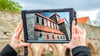 Virtuelle Darstellung der einstigen Klosterkirche. Mittels QR-Codes kann jetzt die Architektur in Memleben rekonstruiert werden.