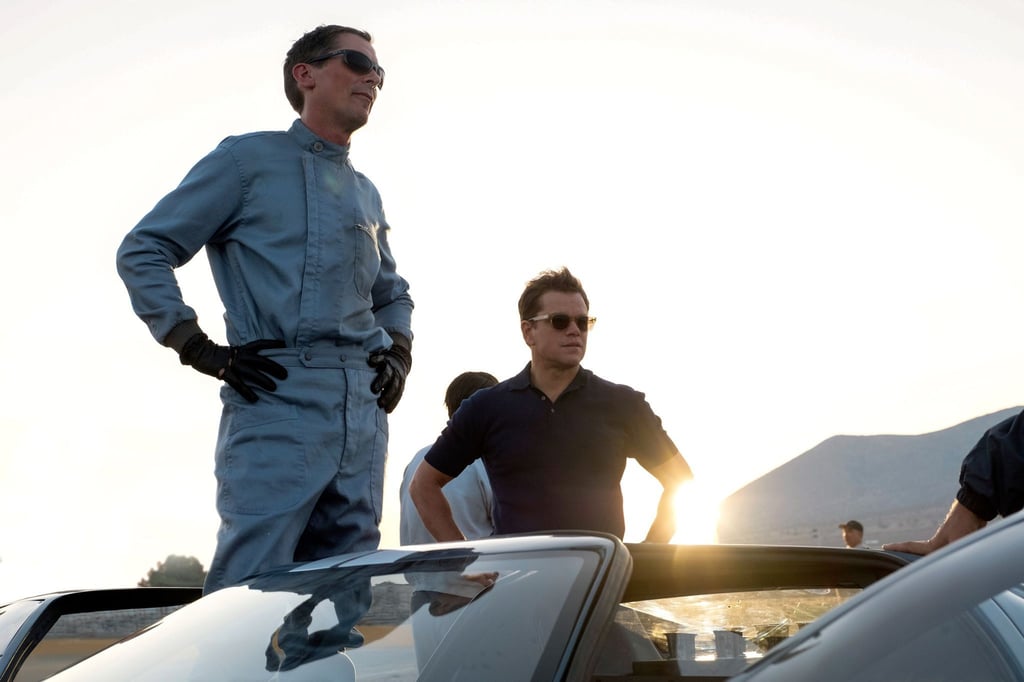 Ken Miles (Christian Bale, l) und Carroll Shelby (Matt Damon) in einer Szene von „Le Mans 66 - Gegen jede Chance“.