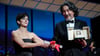 Zahra Amir Ebrahimi (l) überreicht Koji Yakusho den Preis als bester Schauspieler für seine Rolle im Film „Perfect Days“ von Regisseur Wenders.