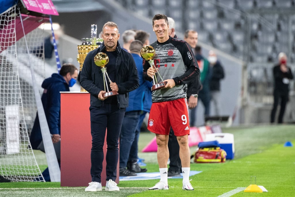 Alte Bayern-Weggefährten: Hansi Flick (l) und Robert Lewandowski.