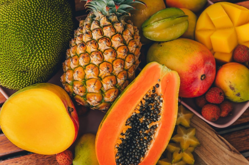 Südfrüchte wie die Papaya gedeihen prächtig in dem Hochland hinter der Küste.