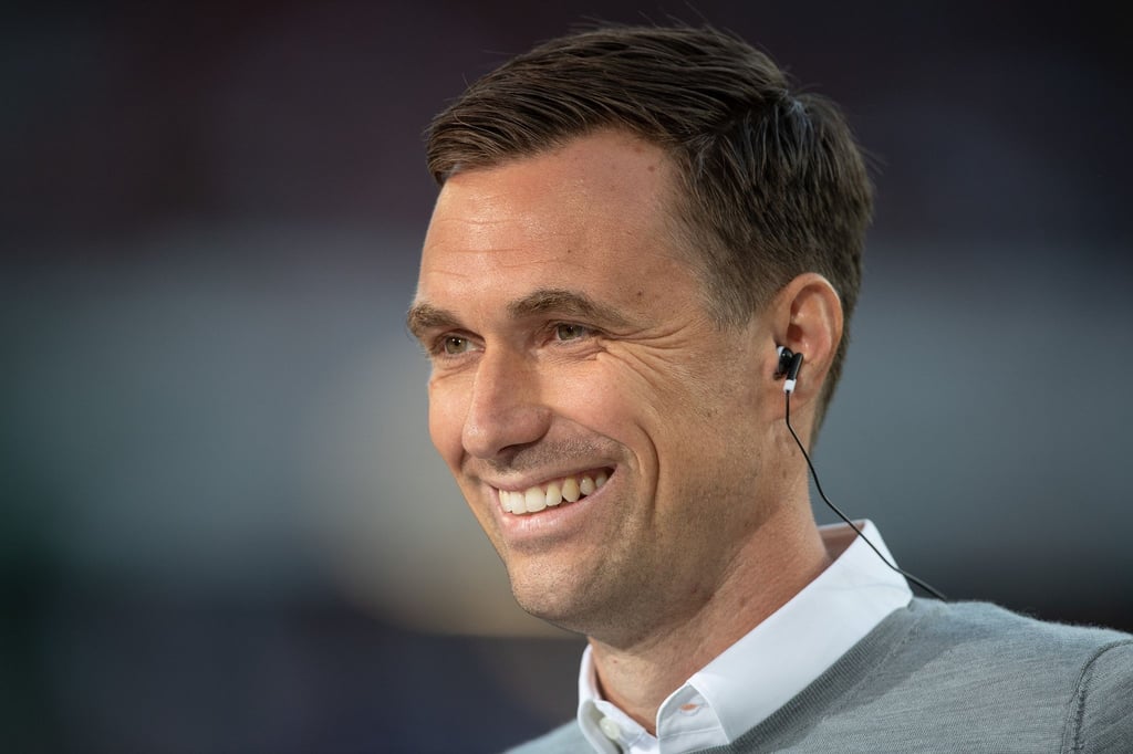 Hannovers Sportdirektor Marcus Mann lächelt.