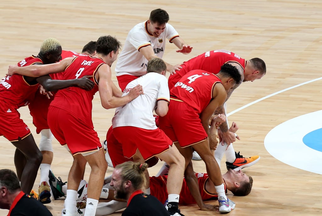 Deutschlands Spieler jubeln nach dem Sieg gegen die USA.