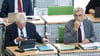 Hartmut Vorjohann (l, CDU), Finanzminister von Sachsen, Armin Schuster (CDU), Innenminister von Sachsen, nehmen an der aktuellen Debatte im Landtag teil.