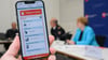 Die Notruf-App nora ist auf einem Smartphone-Display zu sehen.