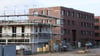 Bundesregierung, Bau- und Wohnungswirtschaft suchen Wege zu mehr bezahlbarem Wohnraum in Deutschland.