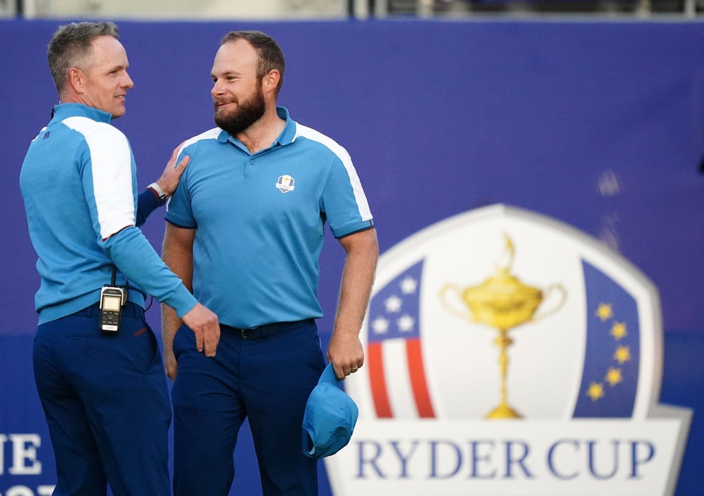 Liegen beim Ryder Cup mit dem Team Europa in Führung: Luke Donald (l) und Viktor Hovland.