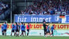 Auswärtsfans des 1. FC Magdeburg beim Zweitliga-Spiel gegen Holstein Kiel am 20. August 2023.