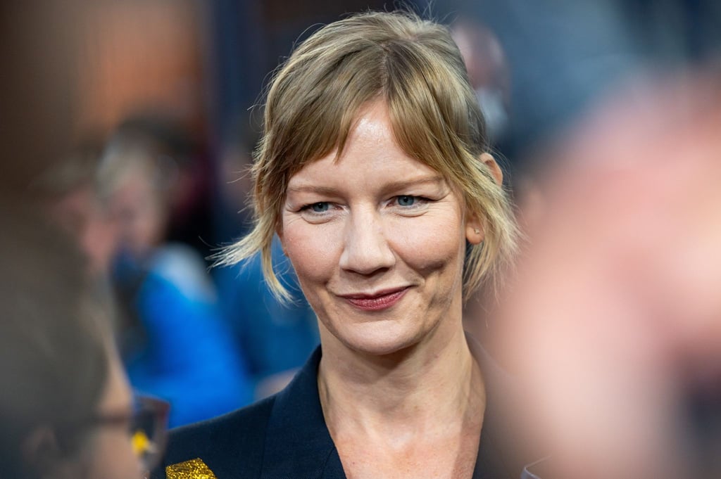 Schauspielerin Sandra Hüller lächelt auf dem Filmfest Hamburg.